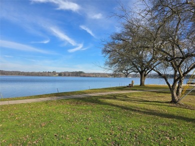 Immaculate Waterfront property featuring a spectacular view of on Culbertson Hills Golf Resort in Pennsylvania - for sale on GolfHomes.com, golf home, golf lot