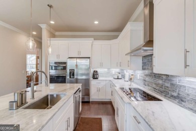 Gorgeous curb appeal for this home.  4 large bedrooms and 3.5 on Traditions of Braselton Golf Club in Georgia - for sale on GolfHomes.com, golf home, golf lot