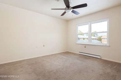 This 2-bedroom, 1-bath Upper Level Lancaster model offers a on Greenbriar Woodlands in New Jersey - for sale on GolfHomes.com, golf home, golf lot