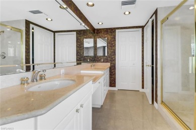 Imagine waking up to the vibrant hues of sunrise painting the on Club at Pelican Bay Golf Course in Florida - for sale on GolfHomes.com, golf home, golf lot