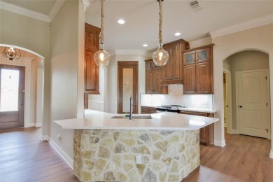 Experience refined living in the prestigious gated golf course on Harbor Lakes Golf Club in Texas - for sale on GolfHomes.com, golf home, golf lot