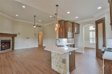 Experience refined living in the prestigious gated golf course on Harbor Lakes Golf Club in Texas - for sale on GolfHomes.com, golf home, golf lot
