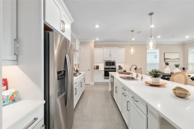 Step into the elegance and comfort of this beautifully appointed on Trilogy at Ocala Preserve in Florida - for sale on GolfHomes.com, golf home, golf lot