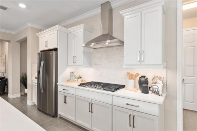 Step into the elegance and comfort of this beautifully appointed on Trilogy at Ocala Preserve in Florida - for sale on GolfHomes.com, golf home, golf lot