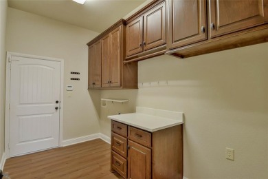 Experience refined living in the prestigious gated golf course on Harbor Lakes Golf Club in Texas - for sale on GolfHomes.com, golf home, golf lot