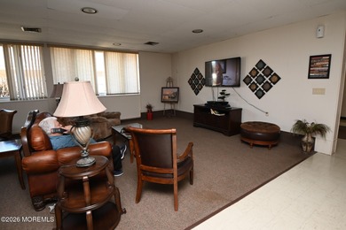 This 2-bedroom, 1-bath Upper Level Lancaster model offers a on Greenbriar Woodlands in New Jersey - for sale on GolfHomes.com, golf home, golf lot