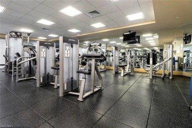 Imagine waking up to the vibrant hues of sunrise painting the on Club at Pelican Bay Golf Course in Florida - for sale on GolfHomes.com, golf home, golf lot