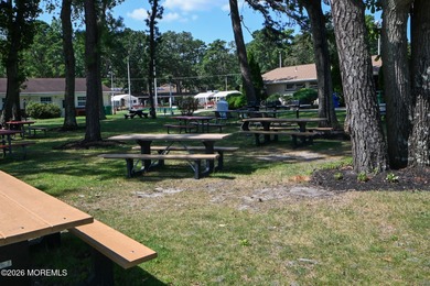 This 2-bedroom, 1-bath Upper Level Lancaster model offers a on Greenbriar Woodlands in New Jersey - for sale on GolfHomes.com, golf home, golf lot