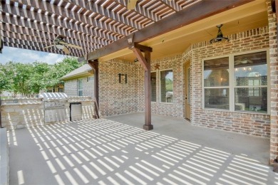 Experience refined living in the prestigious gated golf course on Harbor Lakes Golf Club in Texas - for sale on GolfHomes.com, golf home, golf lot