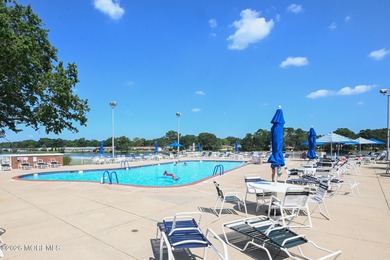 This 2-bedroom, 1-bath Upper Level Lancaster model offers a on Greenbriar Woodlands in New Jersey - for sale on GolfHomes.com, golf home, golf lot