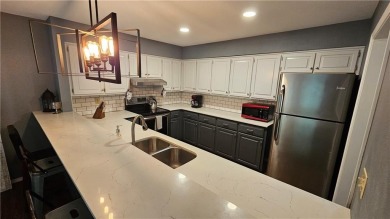 Single level, 3bed/2bath townhouse with 2 parking spaces that is on Bella Vista Country Club - Berksdale in Arkansas - for sale on GolfHomes.com, golf home, golf lot