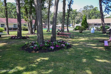 This 2-bedroom, 1-bath Upper Level Lancaster model offers a on Greenbriar Woodlands in New Jersey - for sale on GolfHomes.com, golf home, golf lot