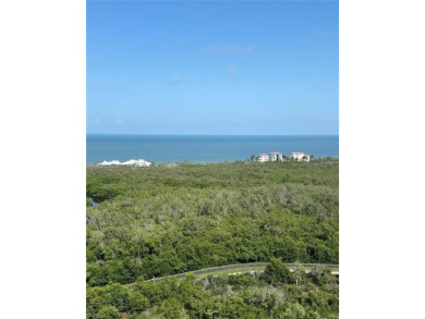 Imagine waking up to the vibrant hues of sunrise painting the on Club at Pelican Bay Golf Course in Florida - for sale on GolfHomes.com, golf home, golf lot