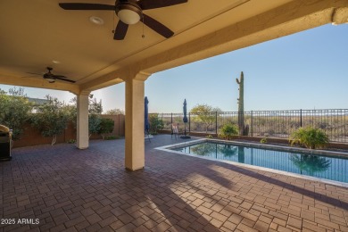Sitting on a premium homesite with Wagner Wash bordering the on Copper Canyon Golf Club in Arizona - for sale on GolfHomes.com, golf home, golf lot