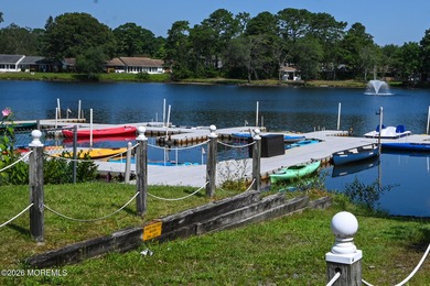 This 2-bedroom, 1-bath Upper Level Lancaster model offers a on Greenbriar Woodlands in New Jersey - for sale on GolfHomes.com, golf home, golf lot