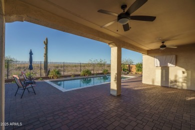 Sitting on a premium homesite with Wagner Wash bordering the on Copper Canyon Golf Club in Arizona - for sale on GolfHomes.com, golf home, golf lot