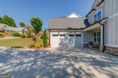 Gorgeous curb appeal for this home.  4 large bedrooms and 3.5 on Traditions of Braselton Golf Club in Georgia - for sale on GolfHomes.com, golf home, golf lot