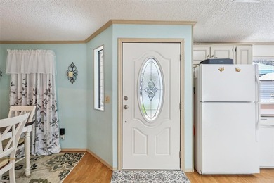 Enjoy relaxed Florida living in this beautifully updated on Plantation Golf Club in Florida - for sale on GolfHomes.com, golf home, golf lot