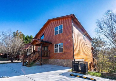 Prime-location luxury STR cabin w/INDOOR POOL, MOVIE THEATER on Sevierville Golf Club in Tennessee - for sale on GolfHomes.com, golf home, golf lot