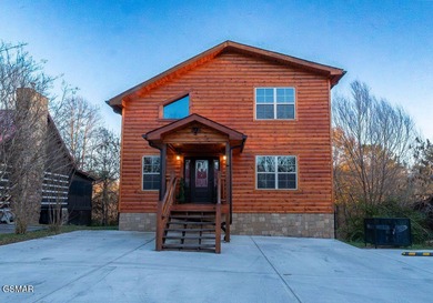 Prime-location luxury STR cabin w/INDOOR POOL, MOVIE THEATER on Sevierville Golf Club in Tennessee - for sale on GolfHomes.com, golf home, golf lot