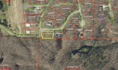 This location is in a nicely wooded area next to the McCauslin on McCauslin Brook Golf and Country Club in Wisconsin - for sale on GolfHomes.com, golf home, golf lot