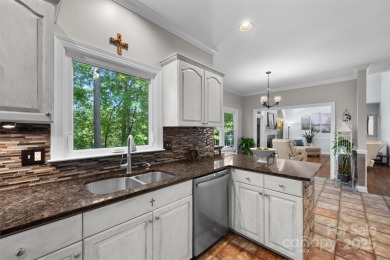 Nestled on the desirable Tega Cay peninsula, this well on Tega Cay Golf Club in South Carolina - for sale on GolfHomes.com, golf home, golf lot