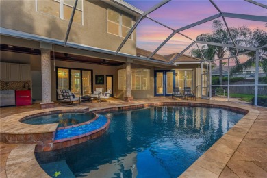 This home is a true SHOWSTOPPER, blending timeless elegance with on Westchase Golf Club in Florida - for sale on GolfHomes.com, golf home, golf lot