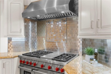 This home is a true SHOWSTOPPER, blending timeless elegance with on Westchase Golf Club in Florida - for sale on GolfHomes.com, golf home, golf lot