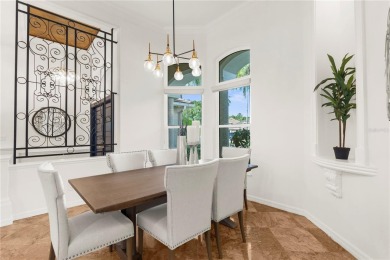 This home is a true SHOWSTOPPER, blending timeless elegance with on Westchase Golf Club in Florida - for sale on GolfHomes.com, golf home, golf lot