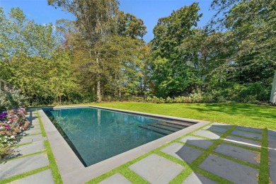 Embrace Scarsdale luxury living in this completely turnkey on Quaker Ridge Golf Club in New York - for sale on GolfHomes.com, golf home, golf lot