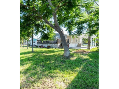 WATERFRONT LIVING AT ITS BEST - LAND OWNERSHIP! NO LOT RENT! on Live Oak Golf Club and RV Park in Florida - for sale on GolfHomes.com, golf home, golf lot