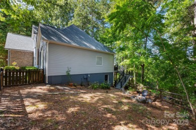 Nestled on the desirable Tega Cay peninsula, this well on Tega Cay Golf Club in South Carolina - for sale on GolfHomes.com, golf home, golf lot