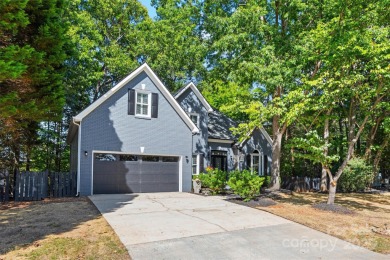 Nestled on the desirable Tega Cay peninsula, this well on Tega Cay Golf Club in South Carolina - for sale on GolfHomes.com, golf home, golf lot