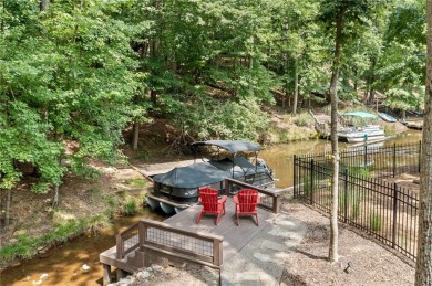 Lake Access and Private Dock! This Charming Lakeside Retreat is on The Highlands Course at Lake Arrowhead in Georgia - for sale on GolfHomes.com, golf home, golf lot