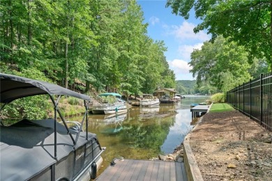 Lake Access and Private Dock! This Charming Lakeside Retreat is on The Highlands Course at Lake Arrowhead in Georgia - for sale on GolfHomes.com, golf home, golf lot