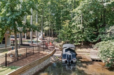 Lake Access and Private Dock! This Charming Lakeside Retreat is on The Highlands Course at Lake Arrowhead in Georgia - for sale on GolfHomes.com, golf home, golf lot
