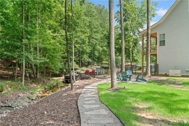 Lake Access and Private Dock! This Charming Lakeside Retreat is on The Highlands Course at Lake Arrowhead in Georgia - for sale on GolfHomes.com, golf home, golf lot