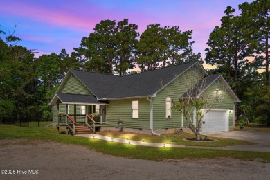 Welcome to 609 Birdie Lane, a stunning retreat tucked away at on The Lakes Country Club in North Carolina - for sale on GolfHomes.com, golf home, golf lot