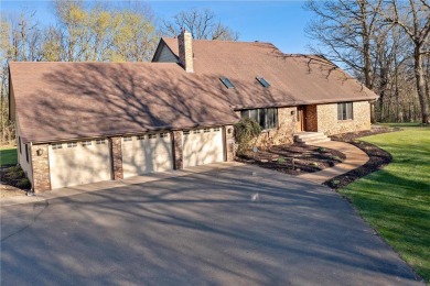 Welcome home to this stunning 5-bedroom, 4-bathroom residence - on Elk River Golf Club in Minnesota - for sale on GolfHomes.com, golf home, golf lot