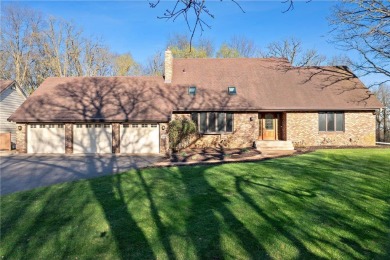 Welcome home to this stunning 5-bedroom, 4-bathroom residence - on Elk River Golf Club in Minnesota - for sale on GolfHomes.com, golf home, golf lot