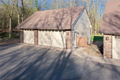 Welcome home to this stunning 5-bedroom, 4-bathroom residence - on Elk River Golf Club in Minnesota - for sale on GolfHomes.com, golf home, golf lot