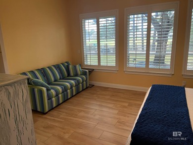 Completely remodeled home in The Peninsula Golf Resort on Peninsula Golf and Racquet Club in Alabama - for sale on GolfHomes.com, golf home, golf lot