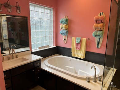 Completely remodeled home in The Peninsula Golf Resort on Peninsula Golf and Racquet Club in Alabama - for sale on GolfHomes.com, golf home, golf lot