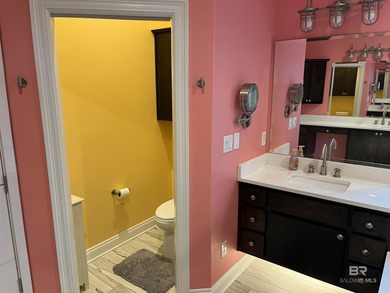 Completely remodeled home in The Peninsula Golf Resort on Peninsula Golf and Racquet Club in Alabama - for sale on GolfHomes.com, golf home, golf lot