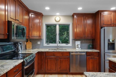 Tucked at the end of a quiet cul-de-sac, 877 Red Fox Drive on Innsbrook Resort Golf Course in Missouri - for sale on GolfHomes.com, golf home, golf lot
