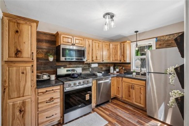 This cutie of a home is perfectly located in the heart of on Princeton Golf Course in Minnesota - for sale on GolfHomes.com, golf home, golf lot
