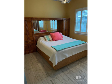 Completely remodeled home in The Peninsula Golf Resort on Peninsula Golf and Racquet Club in Alabama - for sale on GolfHomes.com, golf home, golf lot