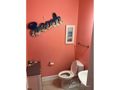 Completely remodeled home in The Peninsula Golf Resort on Peninsula Golf and Racquet Club in Alabama - for sale on GolfHomes.com, golf home, golf lot