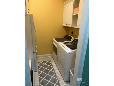 Completely remodeled home in The Peninsula Golf Resort on Peninsula Golf and Racquet Club in Alabama - for sale on GolfHomes.com, golf home, golf lot