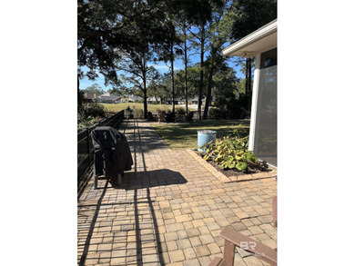 Completely remodeled home in The Peninsula Golf Resort on Peninsula Golf and Racquet Club in Alabama - for sale on GolfHomes.com, golf home, golf lot